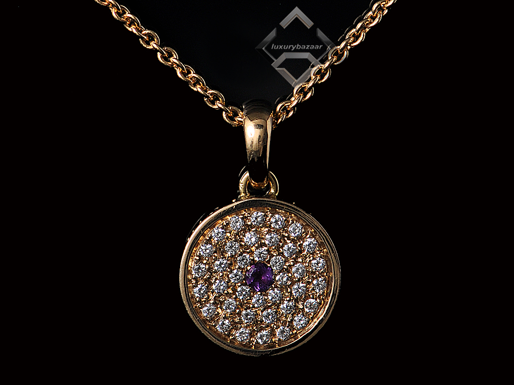 ... are pictures of the pendant in 18K yellow gold from Luxury Bazaar